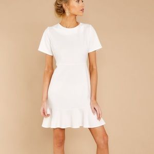 White summer dress with ruffles bottom